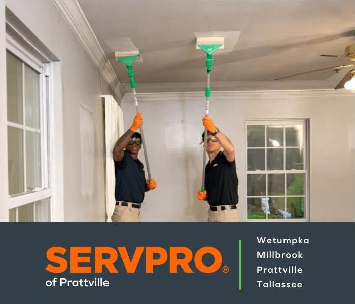 SERVPRO of Prattville techs cleaning up soot on the ceiling